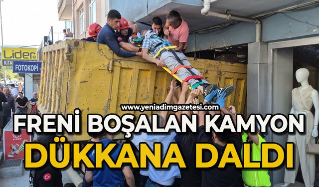 Freni patlayan hafriyat kamyonu iş yerine daldı