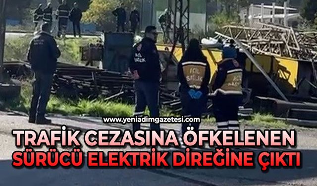 Trafik cezasına öfkelenen sürücü elektrik direğine çıktı