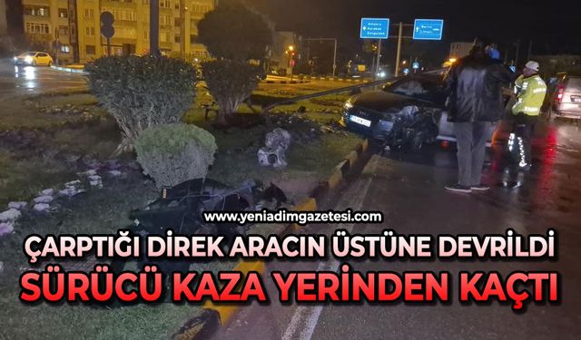 Çarptığı direk aracın üstüne devrildi, sürücü kaza yerinden kaçtı