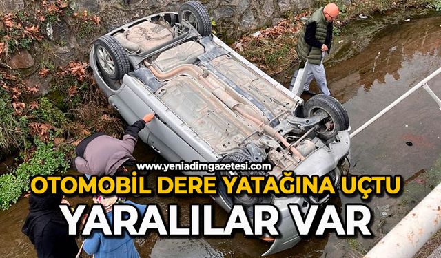 Otomobil dere yatağına uçtu: Yaralılar var
