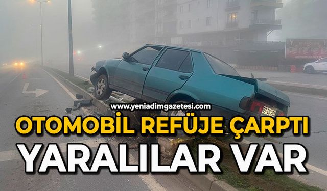 Otomobil refüje çarptı: Yaralılar var