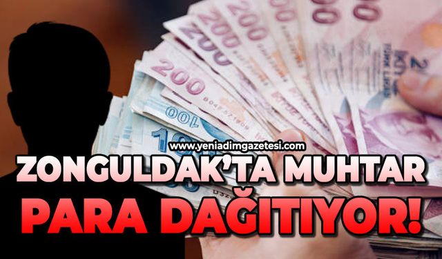 Zonguldak’ta muhtar para dağıtıyor