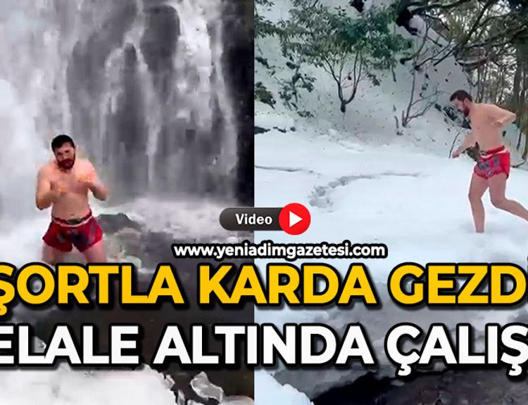 Şortla karda gezdi: Şelale altında çalıştı