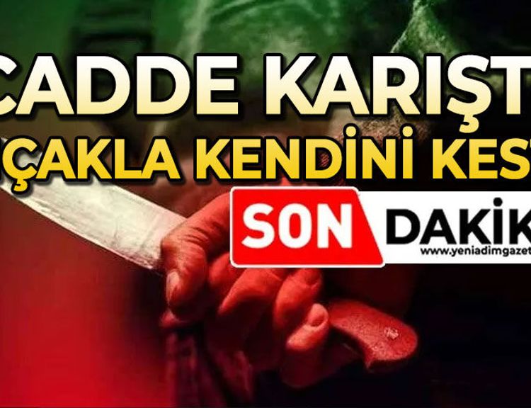 Cadde karıştı: Kendini bıçakla kesti