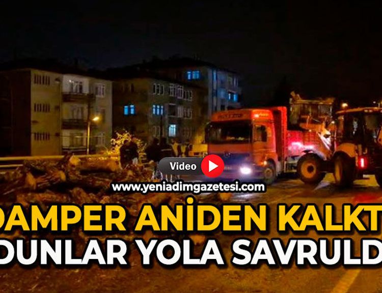 Damper aniden kalktı: Odunlar yola savruldu