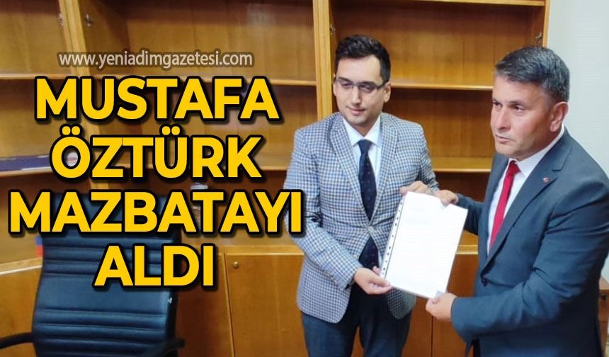 Mustafa Öztürk mazbatayı aldı