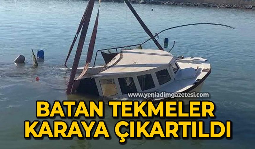 Dev dalgaların arasında batan tekneler karaya çıkartıldı