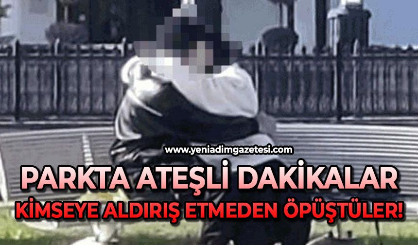 Parkta ateşli dakikalar: Kimseye aldırış etmeden öpüştüler!