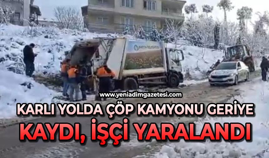 Karlı yolda çöp kamyonu geriye kaydı, işçi yaralandı