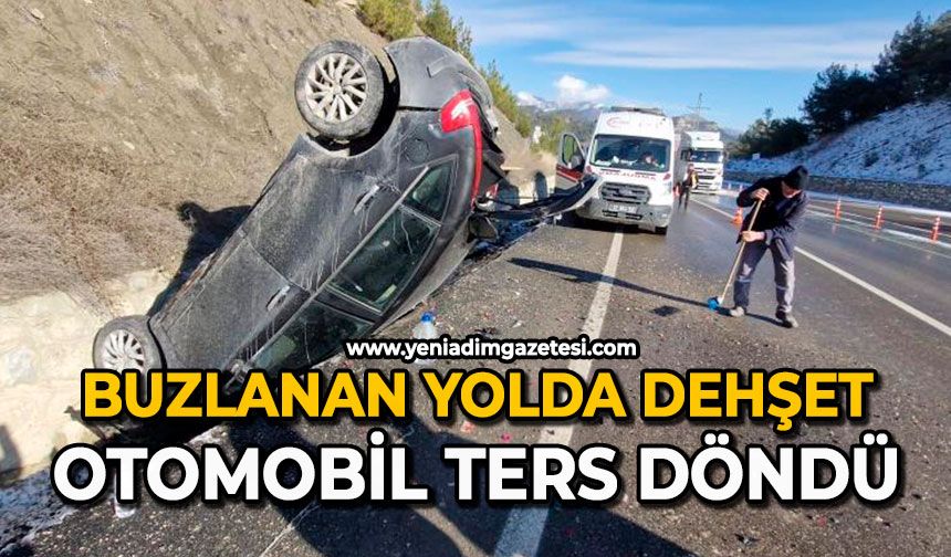Buzlanan yolda dehşet: Otomobil ters döndü