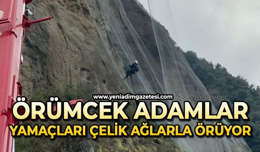 Örümcek adamlar yamaçları çelik ağlarla örüyor