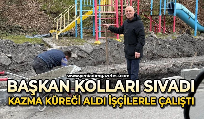 Başkan kolları sıvadı: Kazma küreği alarak işçilerle birlikte çalıştı