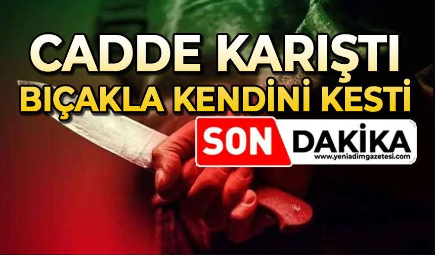 Cadde karıştı: Kendini bıçakla kesti