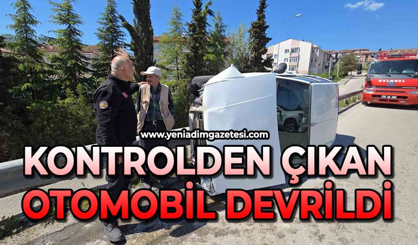 Kontrolden çıkan otomobil yan devrildi
