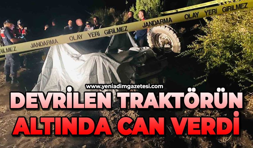 Devrilen traktörün altında can verdi