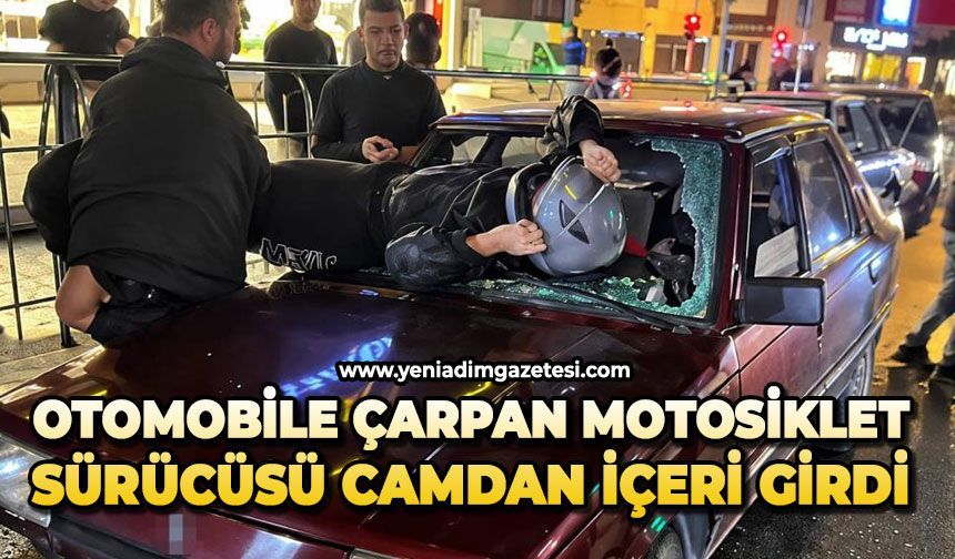 Otomobile çarpan motosiklet sürücüsü camdan içeri girdi