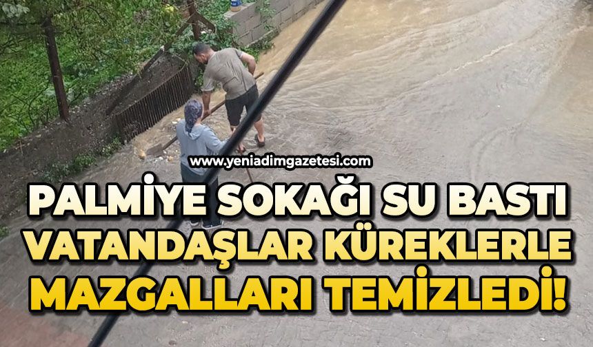 Palmiye sokağı su bastı: Vatandaşlar küreklerle mazgalları temizledi!