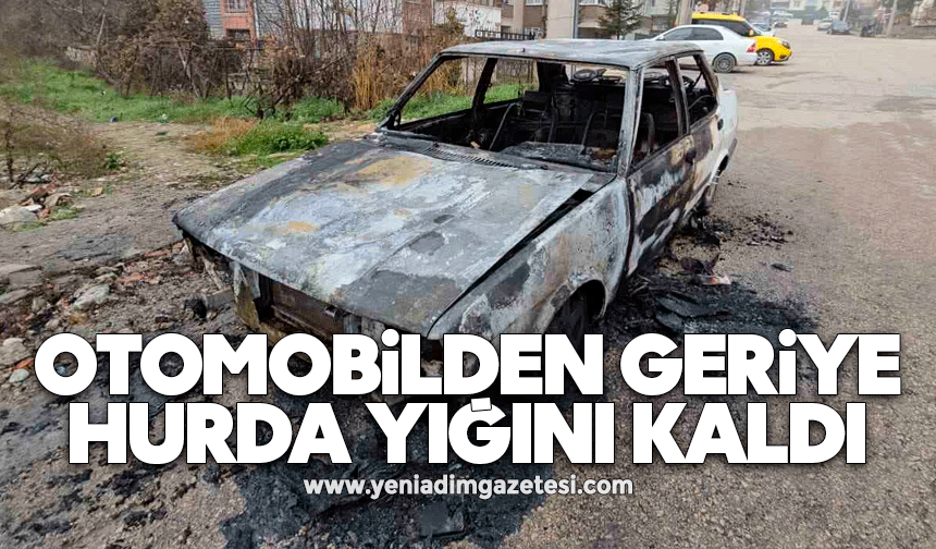 Alev topuna dönen otomobilden geriye demir yığını kaldı
