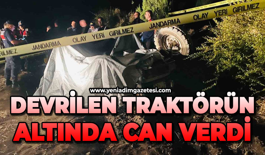 Devrilen traktörün altında can verdi