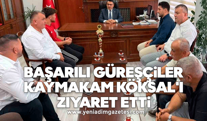 Başarılı güreşçiler Kaymakam Köksal'ı ziyaret etti