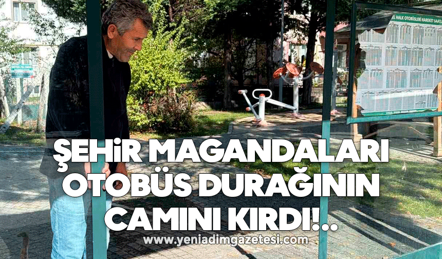 Şehir magandaları otobüs durağının camını kırdı